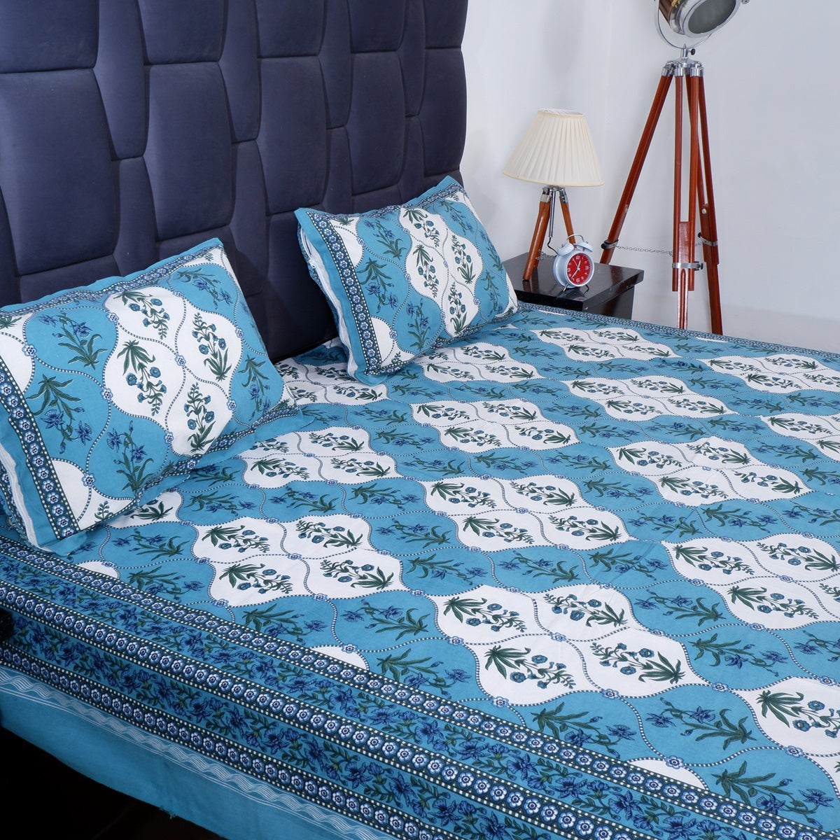 Pure cotton bed sheet Jaipur with intricate blue floral patterns and matching pillow covers for elegant bedding.